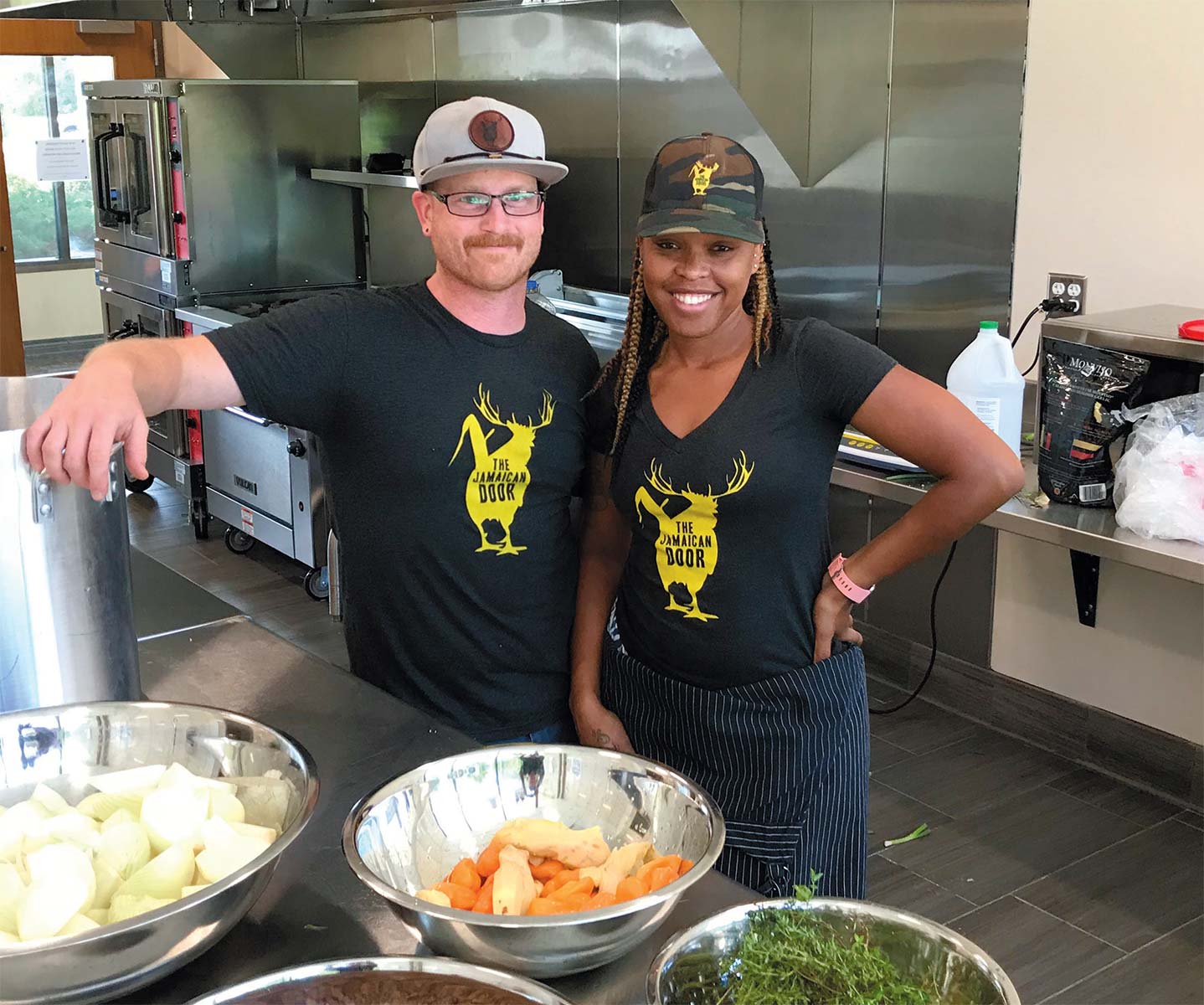Carlin and Georgina Hatch making a new batch of their Jamaican Door jerk sauce in the the new NWTC kitchen in Sister Bay.