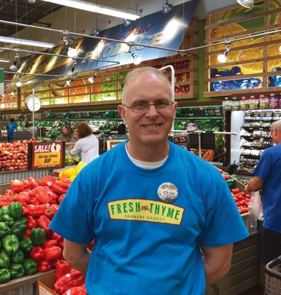 Store Manager Chris Gilbert inside the new Fresh Thyme Farmers Market in Ashwaubenon.