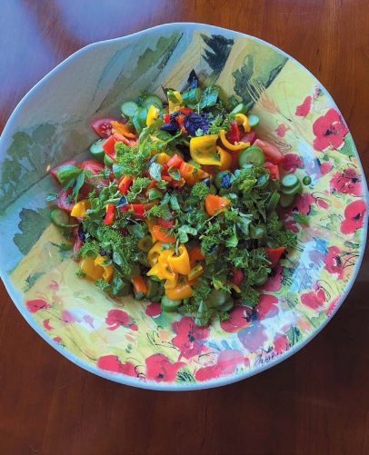 This Tuscan bowl adds color to a pepper salad with every herb added that was growing at the time. Photo by Maryann Liguore.