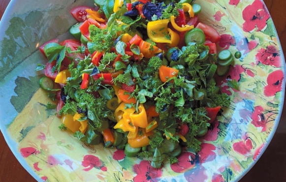 This Tuscan bowl adds color to a pepper salad with every herb added that was growing at the time. Photo by Maryann Liguore.