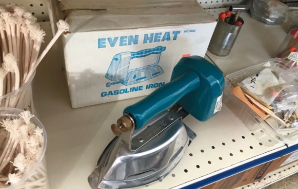 The store's product line reflects the community's reliance on gas such as a gas iron.