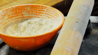Bowl of flour and rolling pin